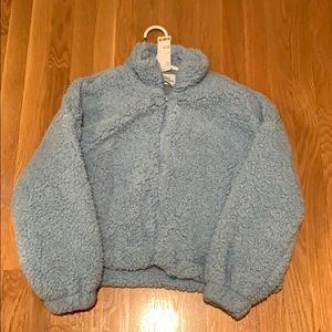 blue fluffy zip up jacket